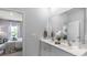 Elegant bathroom featuring double sinks, granite countertops, and modern fixtures at 1170 Silver Perch Place, Sunset Beach, NC 28468