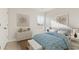 Bright bedroom featuring coastal decor, a decorative dresser and a serene view at 1171 Silver Perch Place, Sunset Beach, NC 28468