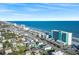 A picturesque view of the coastline neighborhood and resort on the beach at 1210 N Waccamaw Dr. # 305, Murrells Inlet, SC 29576