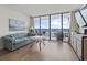 Cozy living room with ocean view, comfortable seating, and stylish decor at 1210 N Waccamaw Dr. # 305, Murrells Inlet, SC 29576
