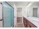 Bathroom featuring dual sinks, a walk-in shower, and neutral paint at 1217 Cymmer Ct., Conway, SC 29527