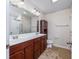 Bathroom featuring dual sinks, a large mirror, and a shower at 1217 Cymmer Ct., Conway, SC 29527