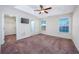 Spacious main bedroom with ceiling fan, ensuite bathroom, and a walk-in closet at 1217 Cymmer Ct., Conway, SC 29527