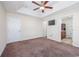 Spacious main bedroom featuring ensuite bathroom and ceiling fan at 1217 Cymmer Ct., Conway, SC 29527