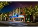 Night view of a classic movie theater, brightly lit with a marquee, and festive decorations at 1217 Cymmer Ct., Conway, SC 29527