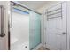 Bathroom shower with frosted sliding doors and a convenient hand rail for added safety at 1217 Cymmer Ct., Conway, SC 29527