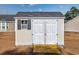 Backyard storage shed with a double door entryway, providing a secure place to store your belongings at 1217 Cymmer Ct., Conway, SC 29527