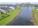 Aerial view of homes with lake access at 122 New Paradise Way, Myrtle Beach, SC 29588