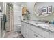 This bathroom features a granite countertop vanity and tub and shower combination at 122 New Paradise Way, Myrtle Beach, SC 29588