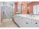 This bathroom showcases double sinks, an open shower, and contemporary fixtures at 122 New Paradise Way, Myrtle Beach, SC 29588