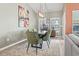 Stylish dining room with seating for four, featuring modern lighting, comfortable seating and a serene color palette at 122 New Paradise Way, Myrtle Beach, SC 29588