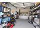 Well-organized garage featuring shelving units, tools, and ample storage options at 122 New Paradise Way, Myrtle Beach, SC 29588