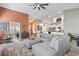 Bright and airy living room area with a view into the kitchen and breakfast nook, offering an open, flowing floorplan at 122 New Paradise Way, Myrtle Beach, SC 29588