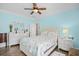 Inviting bedroom with ceiling fan, windows, and well-coordinated furnishings at 1290 Prescott Circle, Myrtle Beach, SC 29577