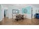 The dining room features a stylish table with unique chairs and a decorative mirror at 1290 Prescott Circle, Myrtle Beach, SC 29577