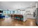 Spacious kitchen with white cabinets, granite countertops, large center island and seating at 1290 Prescott Circle, Myrtle Beach, SC 29577