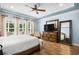 Generous main bedroom offering a ceiling fan, large windows, and neutral decor at 1290 Prescott Circle, Myrtle Beach, SC 29577