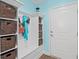 Well-organized mudroom featuring built-in storage, a bench, and coat hooks at 1290 Prescott Circle, Myrtle Beach, SC 29577