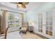 Bright office with a comfortable chair, patterned ottoman, and lots of natural light at 1290 Prescott Circle, Myrtle Beach, SC 29577