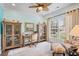 Inviting home office featuring wood cabinets, a writing desk and a comfortable chair at 1290 Prescott Circle, Myrtle Beach, SC 29577