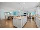 Open concept kitchen and dining area with a large island, hardwood floors, and modern finishes at 1290 Prescott Circle, Myrtle Beach, SC 29577
