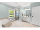 Bright bathroom featuring double sink vanity, jacuzzi tub, and walk-in shower at 131 Sago Palm Dr., Myrtle Beach, SC 29579