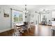 Bright dining room with natural light, views, and stylish furnishings at 131 Sago Palm Dr., Myrtle Beach, SC 29579