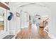 Bright foyer featuring wood-look floors that flow into an open-concept living space at 131 Sago Palm Dr., Myrtle Beach, SC 29579