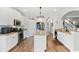 Modern kitchen with stainless steel appliances, granite counters, and center island at 131 Sago Palm Dr., Myrtle Beach, SC 29579