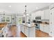 Bright kitchen features granite countertops, stainless appliances, and a center island at 131 Sago Palm Dr., Myrtle Beach, SC 29579