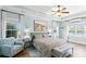 Spacious main bedroom with tray ceiling, wood floors, and waterfront views at 131 Sago Palm Dr., Myrtle Beach, SC 29579