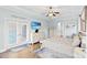Serene main bedroom features a decorative ceiling, TV, and access to balcony at 131 Sago Palm Dr., Myrtle Beach, SC 29579