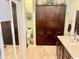 Bright bathroom with plentiful built in storage around a toilet and vanity at 1504 Saint Thomas Circle, Myrtle Beach, SC 29577