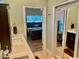 Bright bathroom showcases a double vanity, mirror and access to a walk in closet at 1504 Saint Thomas Circle, Myrtle Beach, SC 29577