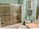 Bathroom with a tiled shower and a neutral vanity providing a functional space at 1504 Saint Thomas Circle, Myrtle Beach, SC 29577
