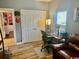 Office space with a comfortable place to work, laminate wood flooring and natural light at 1504 Saint Thomas Circle, Myrtle Beach, SC 29577