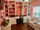 Comfortable home office featuring custom built-in shelving and a cozy couch at 1504 Saint Thomas Circle, Myrtle Beach, SC 29577