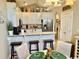 Well-equipped kitchen with stainless steel appliances, granite countertops, and seating at the breakfast bar at 1504 Saint Thomas Circle, Myrtle Beach, SC 29577