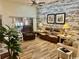 Spacious living room with comfortable seating, elegant decor, and plenty of natural light at 1504 Saint Thomas Circle, Myrtle Beach, SC 29577