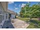 Landscaped backyard featuring a patio and mature trees and plants at 1527 Hallborough Dr., Surfside Beach, SC 29575