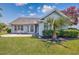 Scenic backyard with lush lawn and outdoor patio at 1527 Hallborough Dr., Surfside Beach, SC 29575