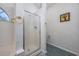Bathroom featuring tile floors, a glass door shower, and neutral wall textures for a clean look at 1527 Hallborough Dr., Surfside Beach, SC 29575