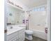 Bright bathroom with a shower and tub combo and sleek white vanity at 1527 Hallborough Dr., Surfside Beach, SC 29575