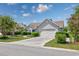 Charming single story home with a two-car garage and mature landscaping at 1527 Hallborough Dr., Surfside Beach, SC 29575