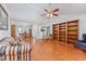 Spacious living room featuring wood floors, high ceilings, and an open layout for versatile furniture arrangement at 1527 Hallborough Dr., Surfside Beach, SC 29575