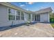 Exterior patio with seating offers a relaxing outdoor space at 1527 Hallborough Dr., Surfside Beach, SC 29575