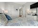This bedroom features a patterned quilt, a dresser and two closets at 1631 Murrell Pl., Murrells Inlet, SC 29576