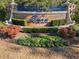 Well-maintained community entrance with brick signage surrounded by colorful landscaping at 1631 Murrell Pl., Murrells Inlet, SC 29576