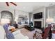 Comfortable living room featuring a fireplace, plush seating, and stylish decor at 1631 Murrell Pl., Murrells Inlet, SC 29576
