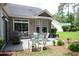 Backyard with a patio, outdoor seating, a grill, and well-maintained landscaping at 170 Glenwood Dr., Conway, SC 29526